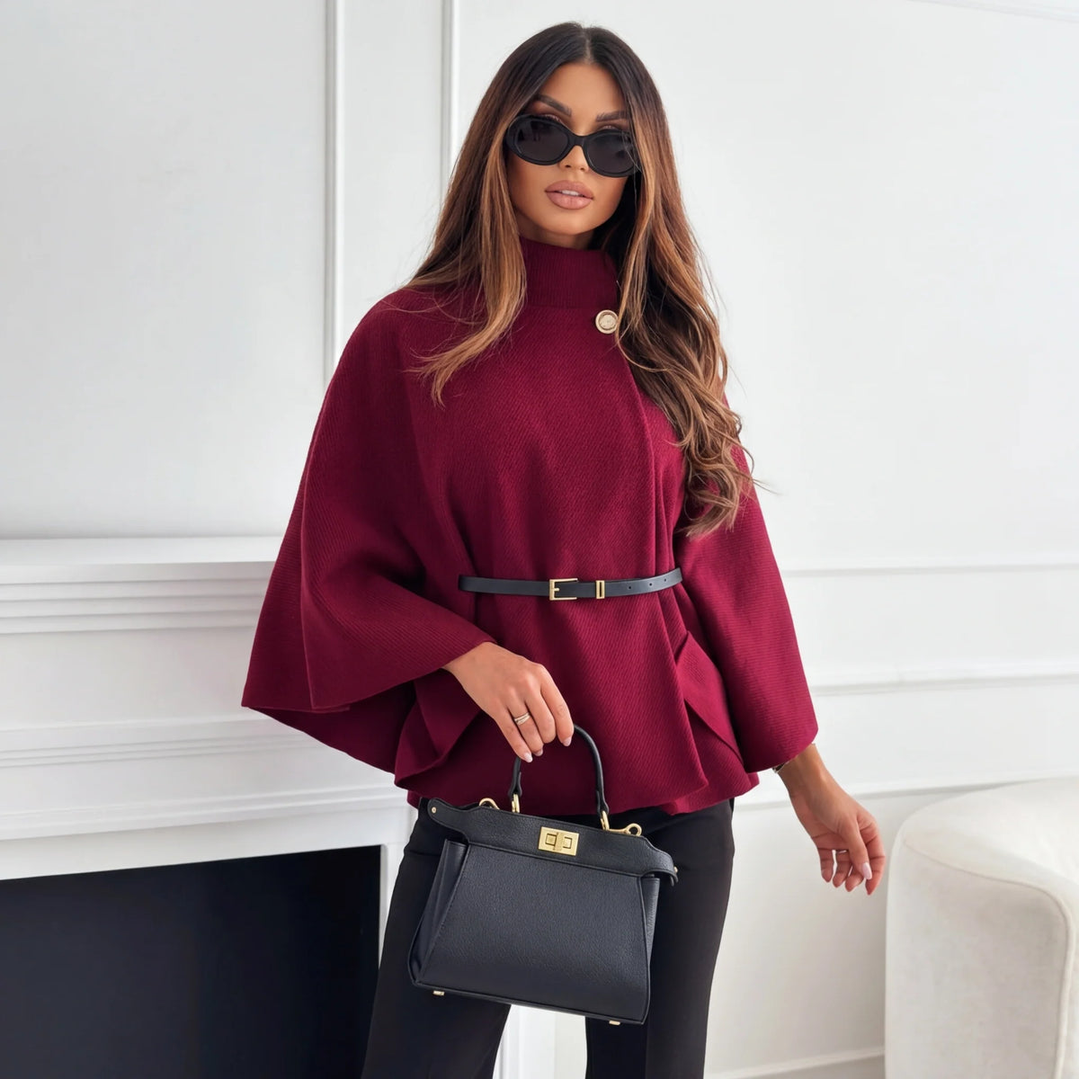Close-up of the funnel collar on the women's wool cape jacket