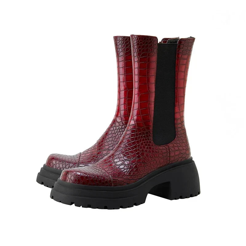 Side view of the women's faux leather Chelsea boots