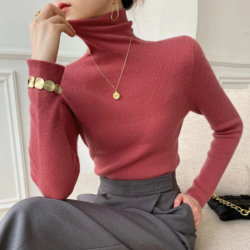 Women's pink ribbed cashmere turtleneck sweater
