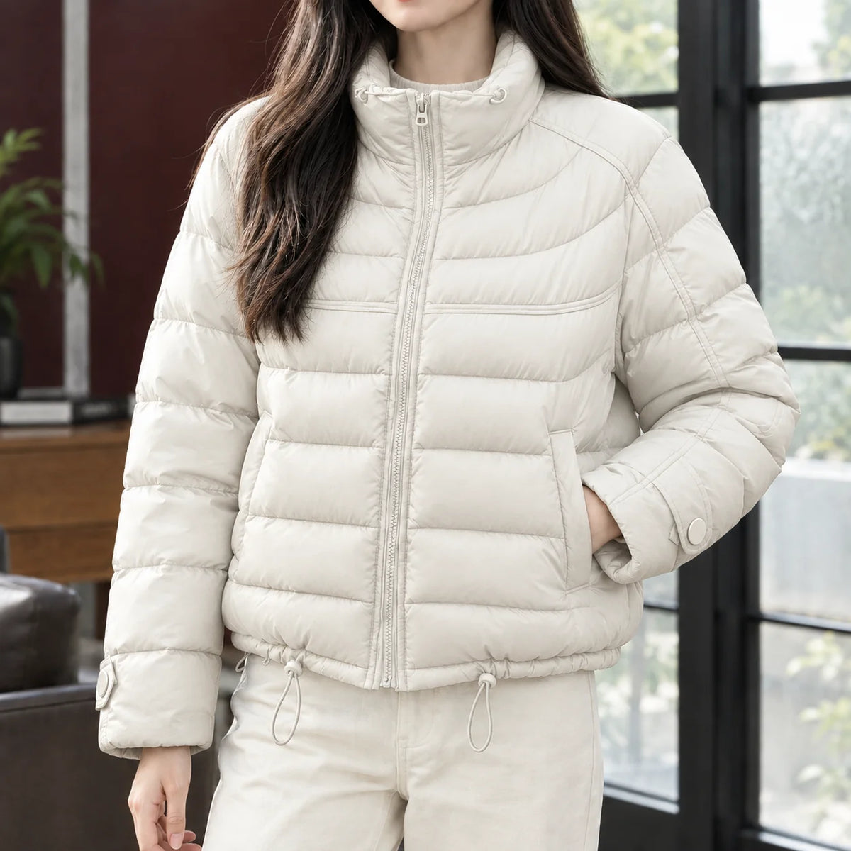 Women's cropped quilted jacket in brown with drawcord hem