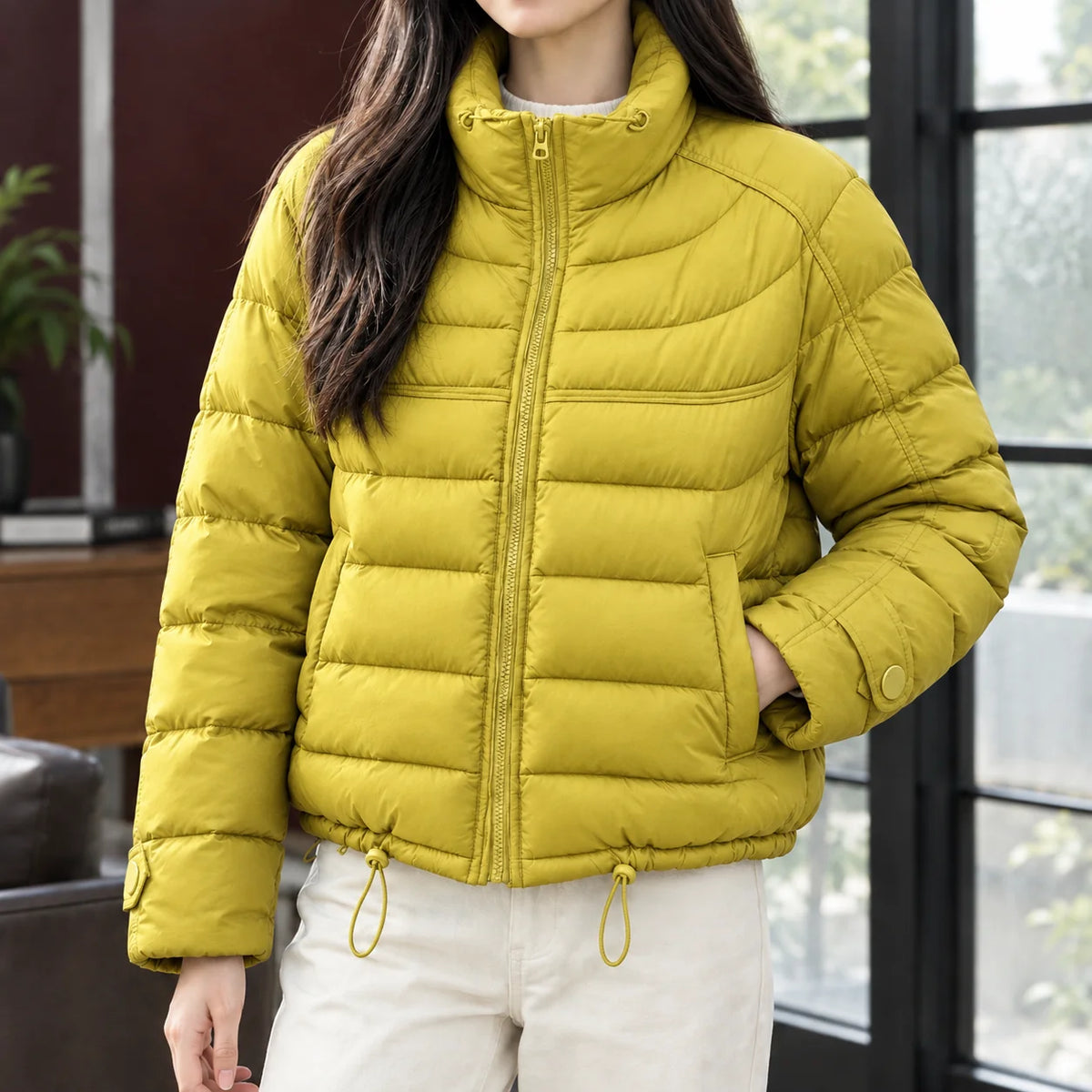 Close-up of the stand collar on the women's cropped quilted jacket