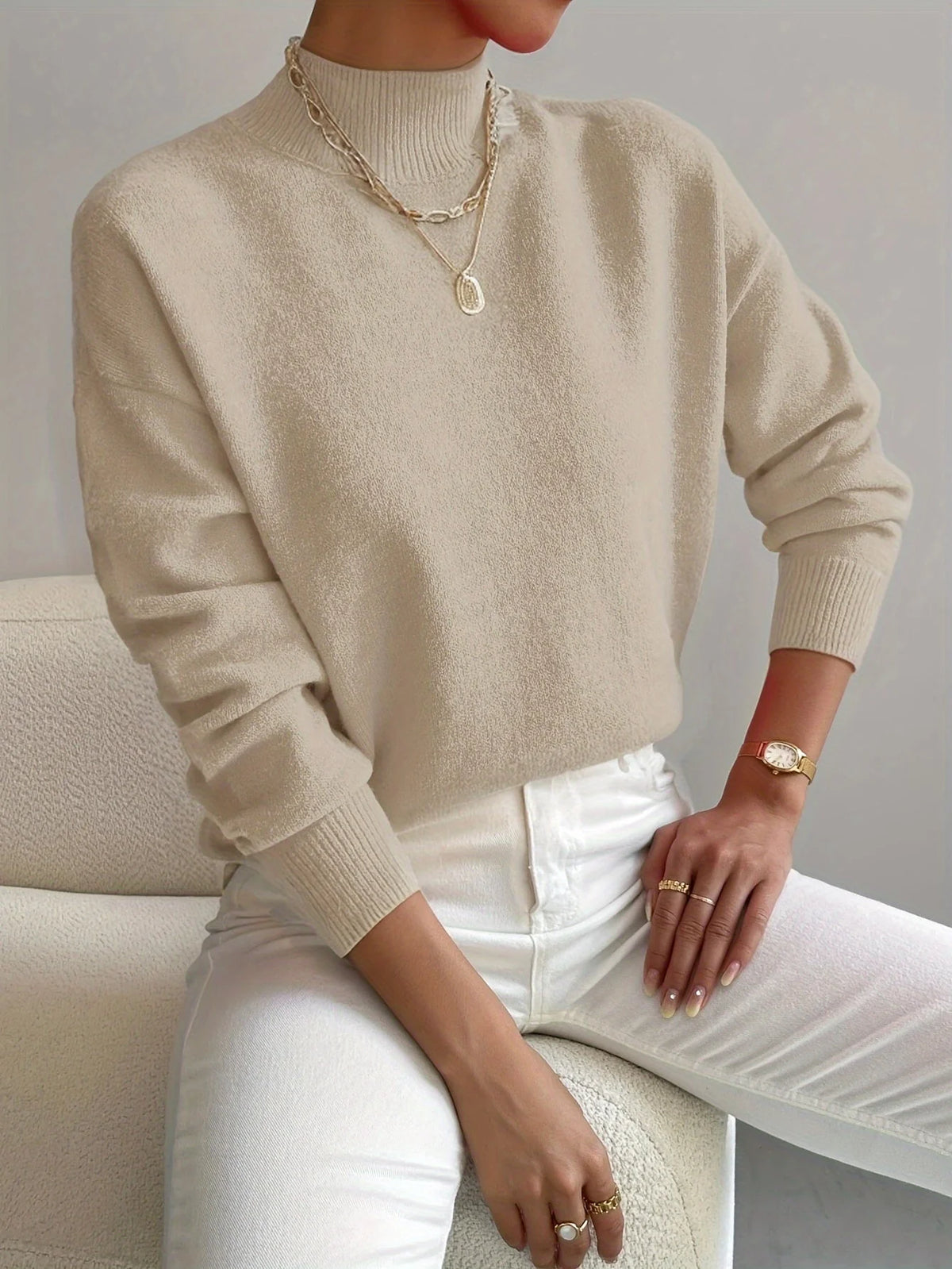 Women's beige oversized mock neck sweater