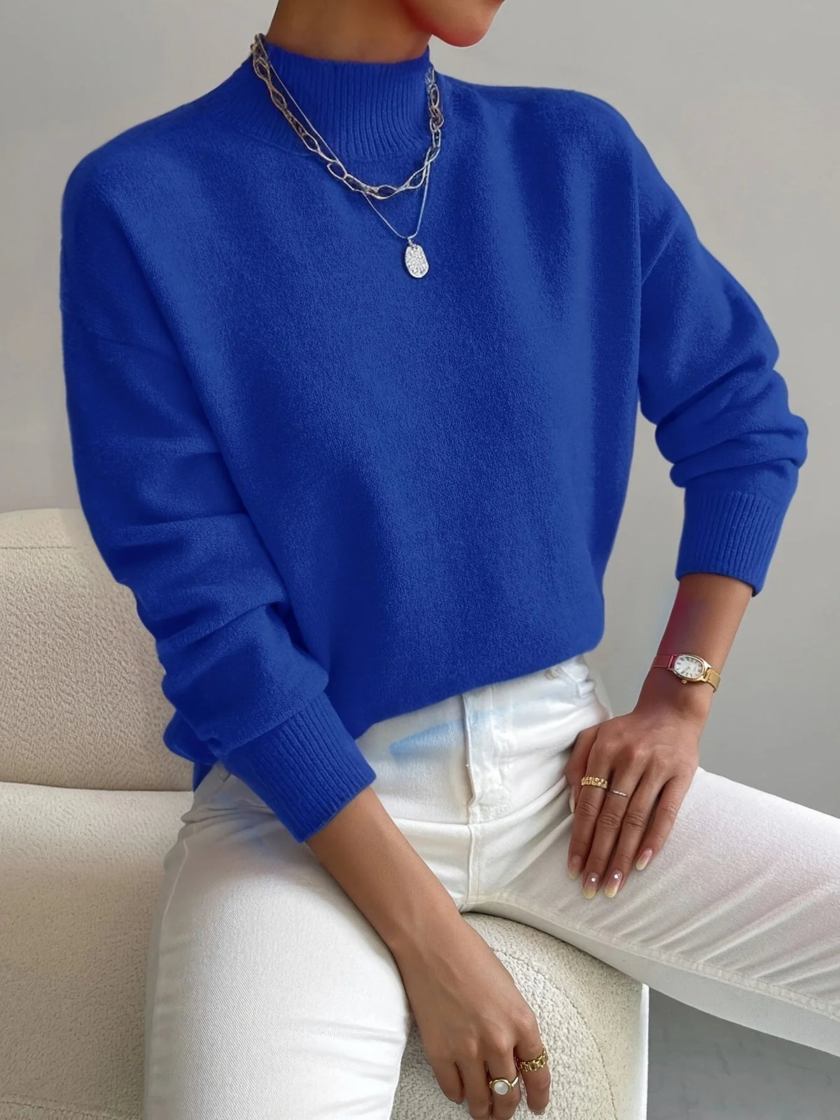 Women's blue oversized mock neck sweater