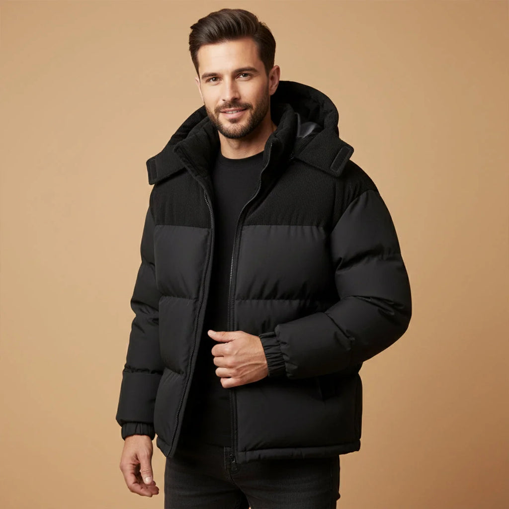 Women's black hooded puffer jacket with corduroy-trim hood