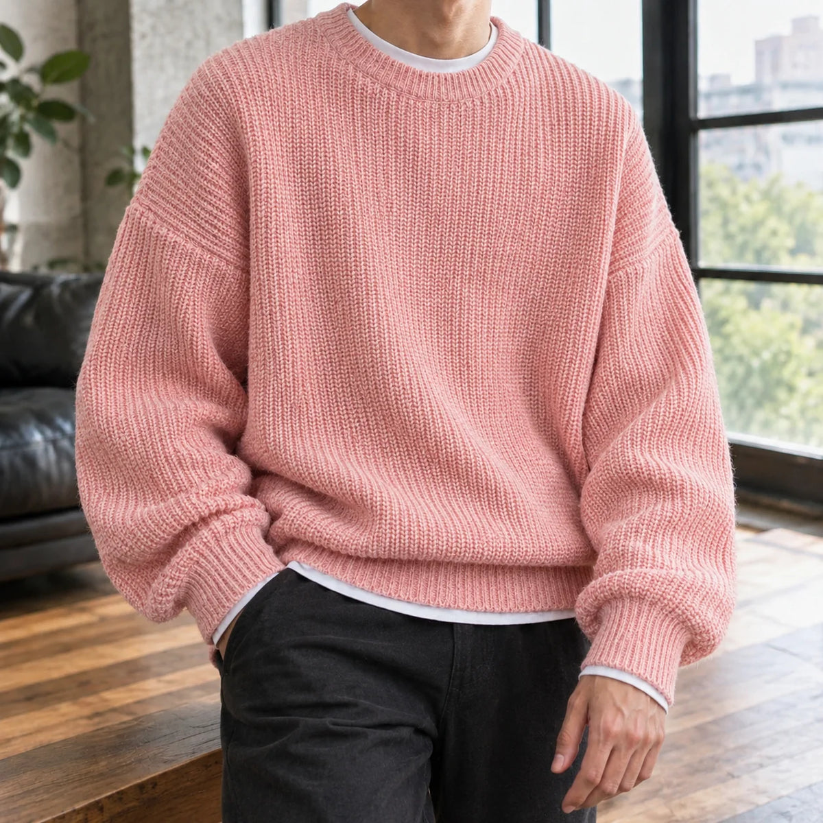 Close-up of the drop shoulder seam on the men's sweater