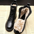 Women's black lace-up ankle boots with faux fur trim