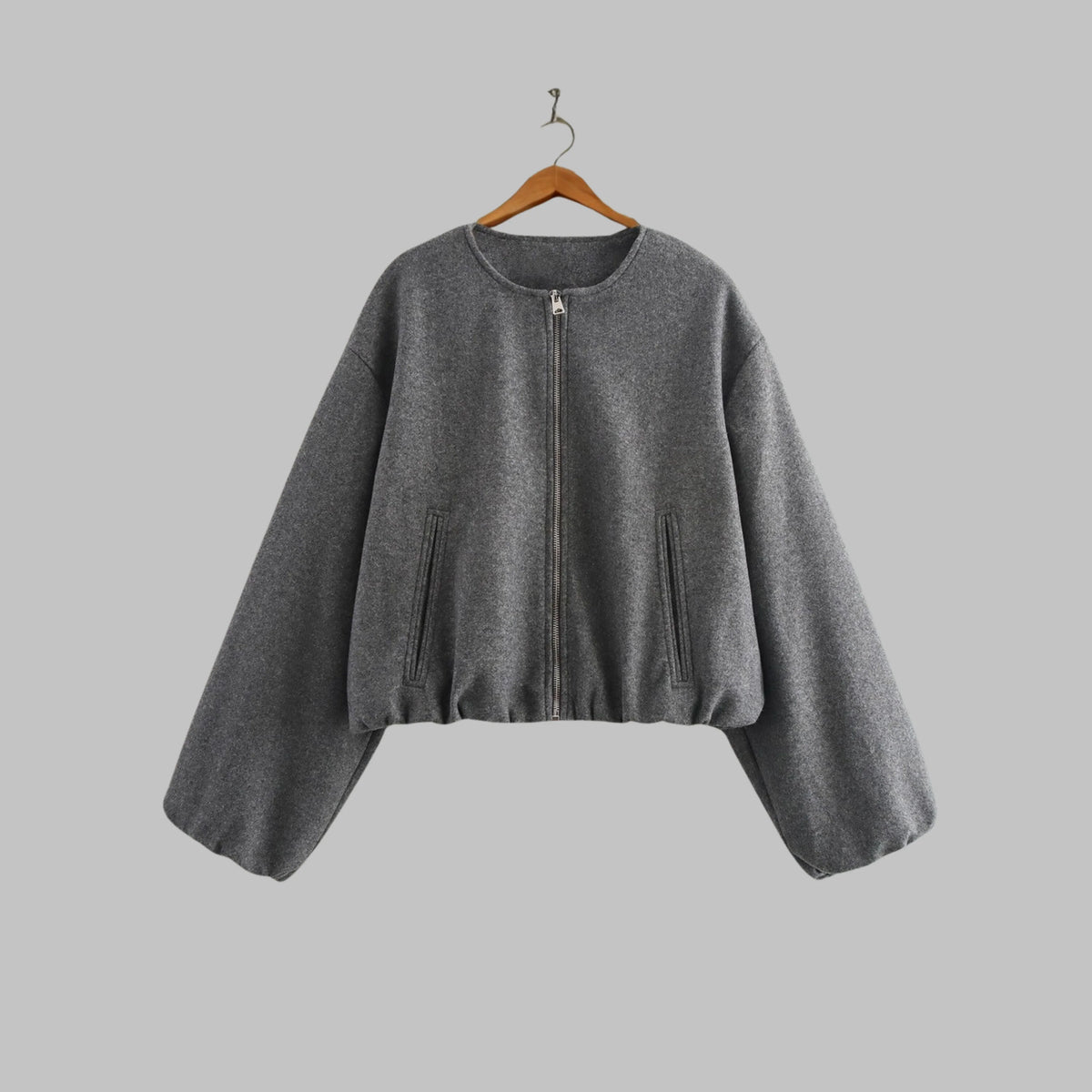 Women's collarless cropped jacket in gray with balloon sleeves