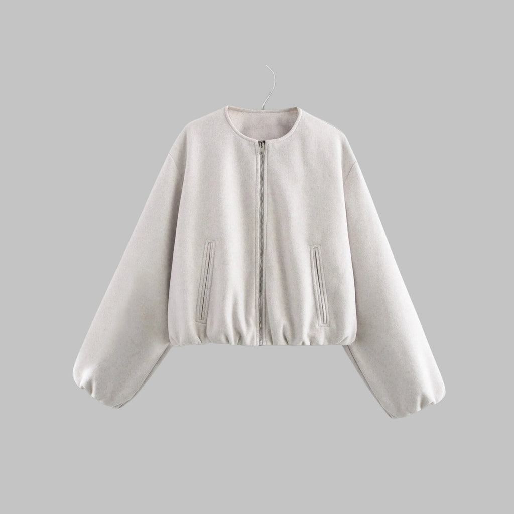 Women's collarless cropped jacket in white with balloon sleeves