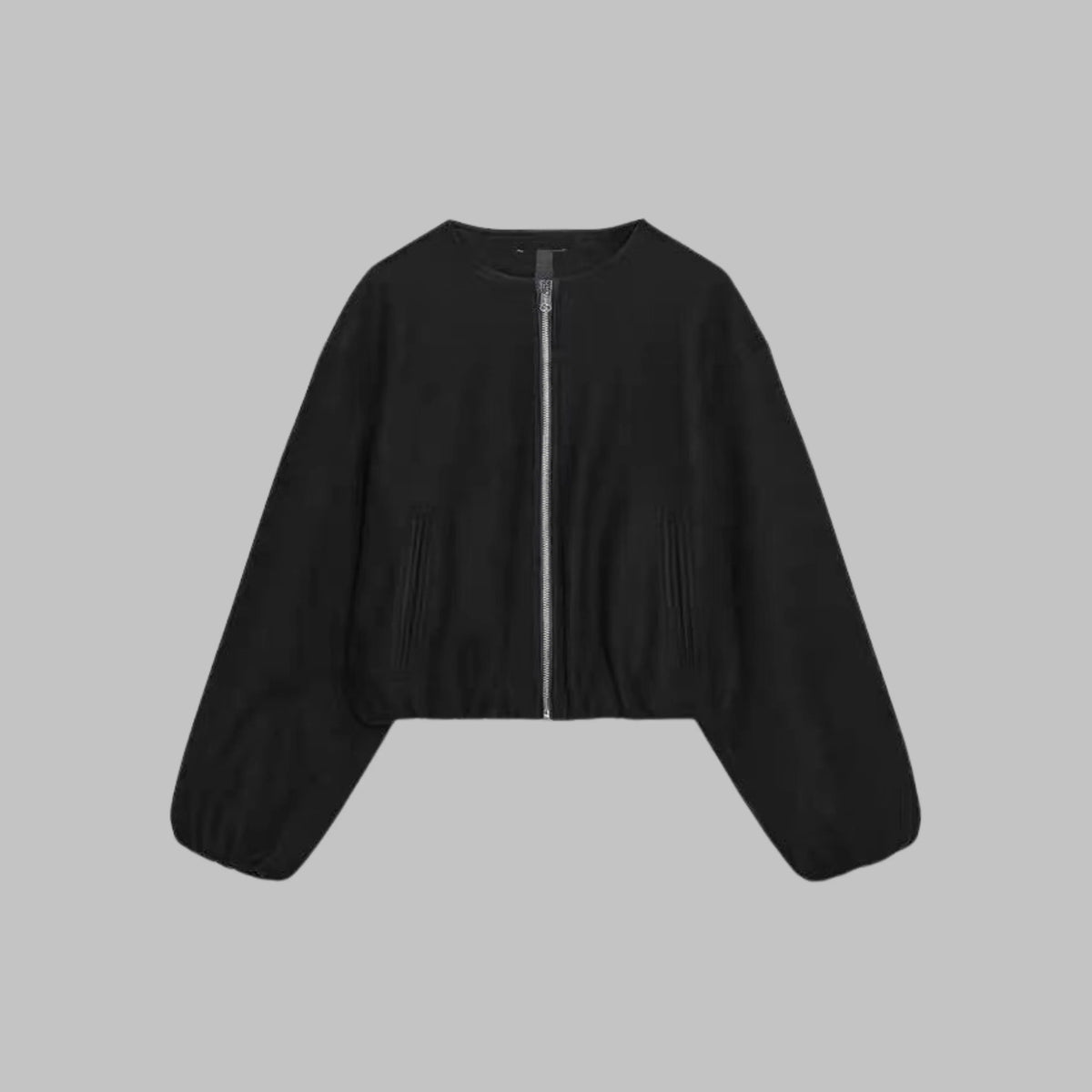 Women's collarless cropped jacket in black with balloon sleeves