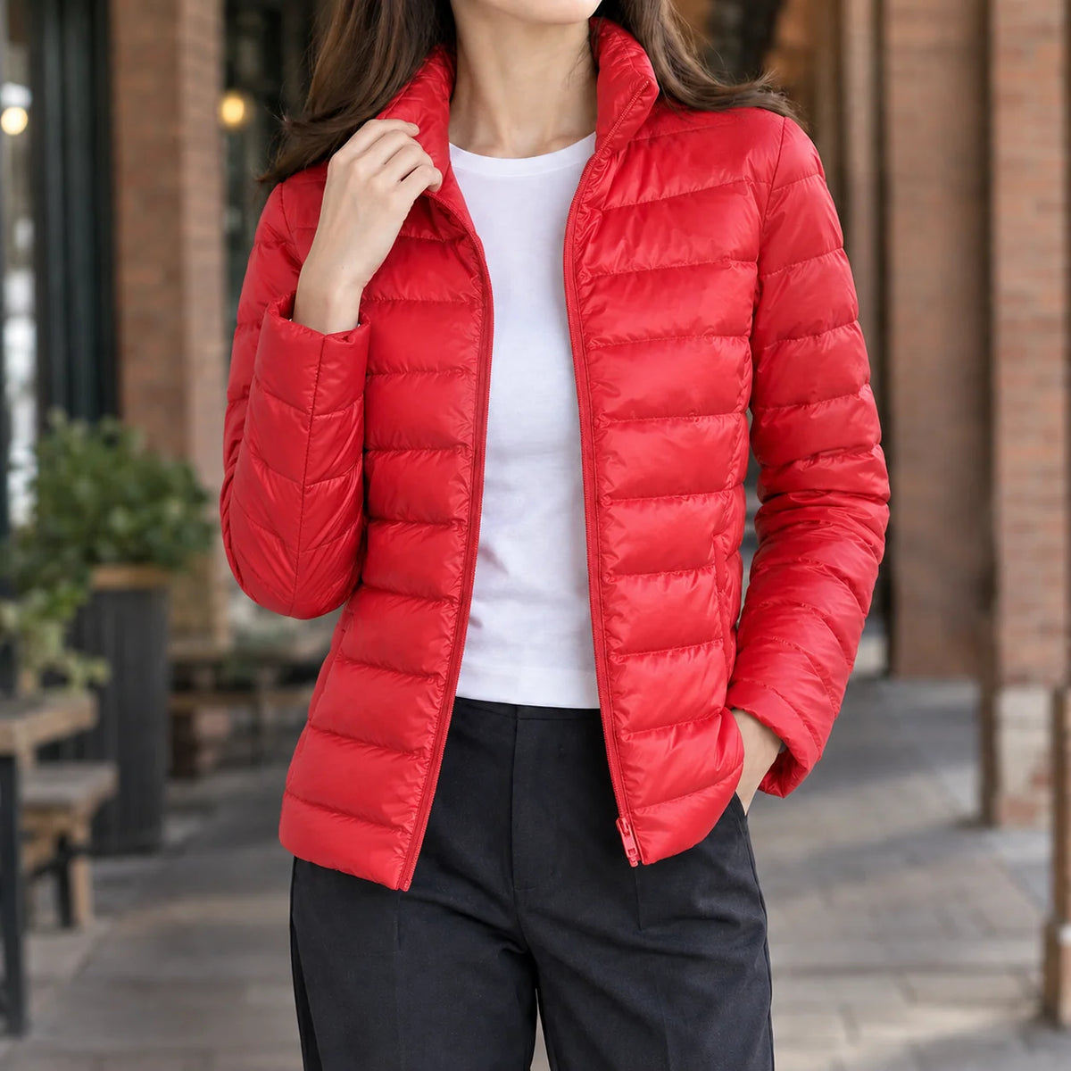 Women's lightweight puffer jacket in navy with stand collar