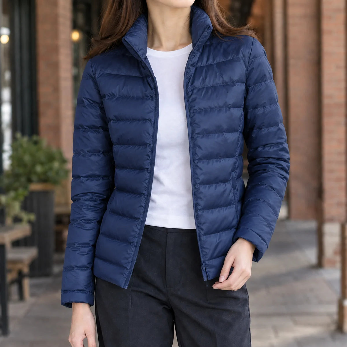 Women's lightweight puffer jacket in pea green with stand collar