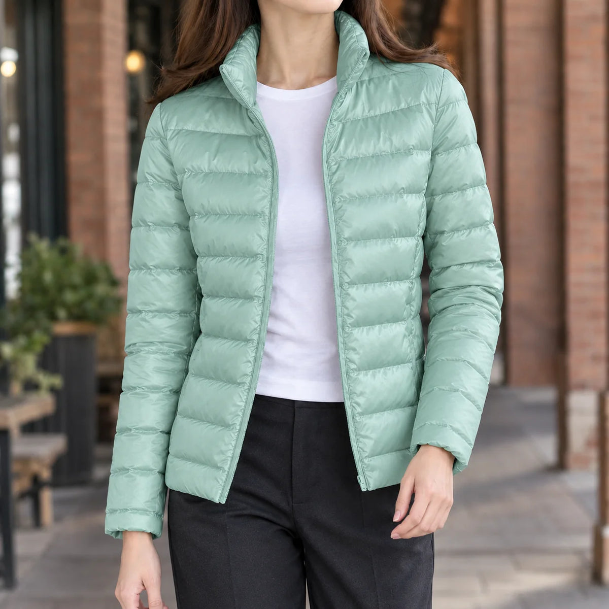 Women's lightweight puffer jacket in haze blue with stand collar