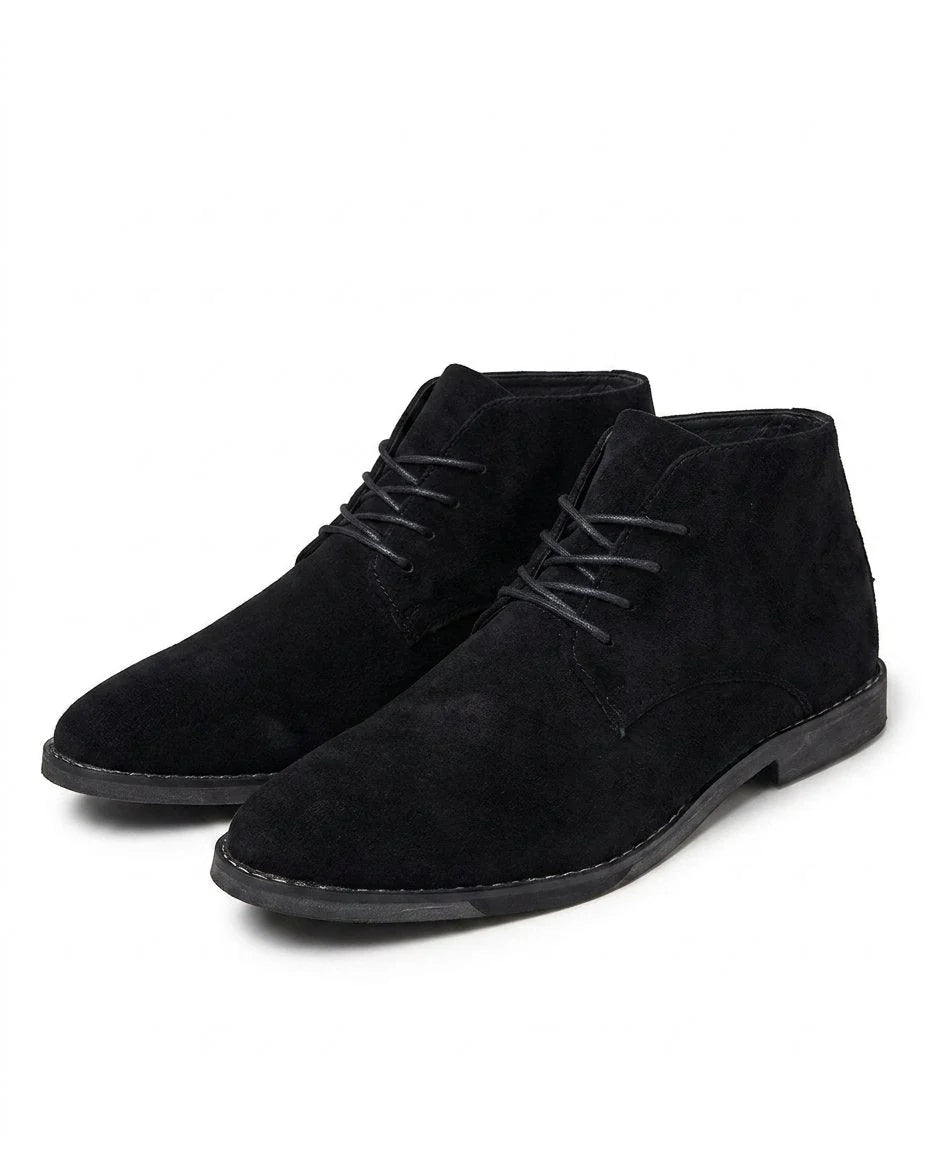 Men's suede Chukka boots styled on foot