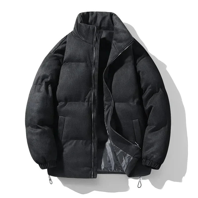 Oversized quilted puffer jacket in black with ribbed cuffs