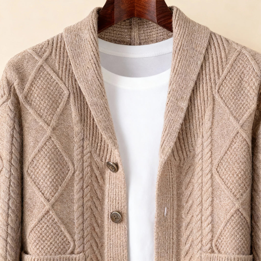 Close-up of the button-front closure on the black cardigan