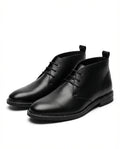 Men's smooth leather Chukka boots in black with solid-color sole