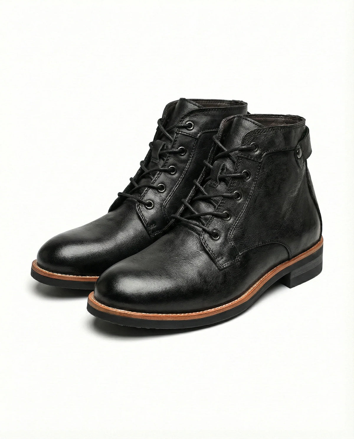 Men's leather work boots styled on foot