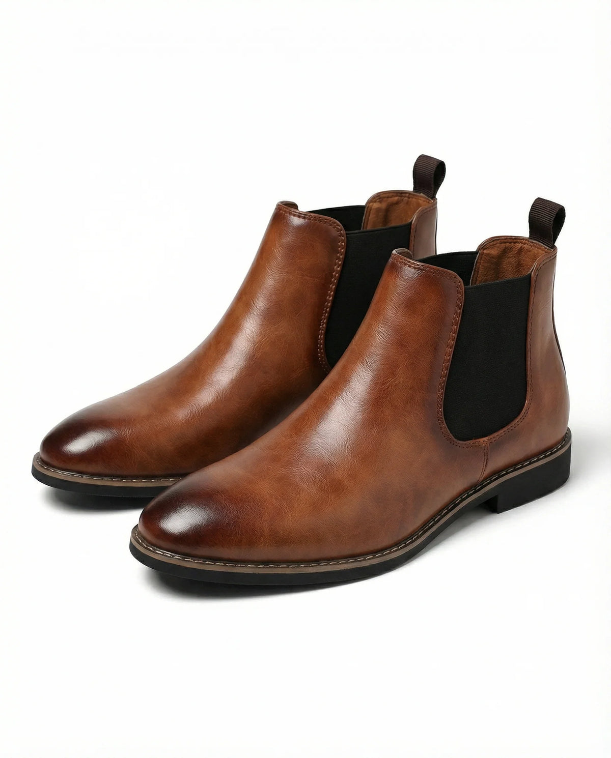 Close-up of the contrast-stitched sole on the brown Chelsea boots