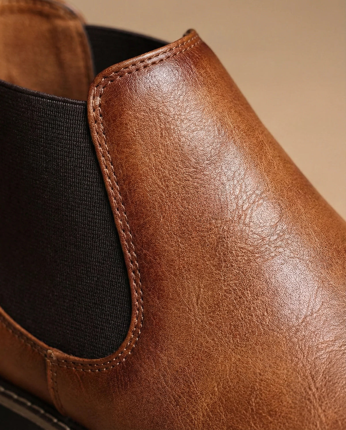 Men's burnished leather Chelsea boots in black with contrast stitching