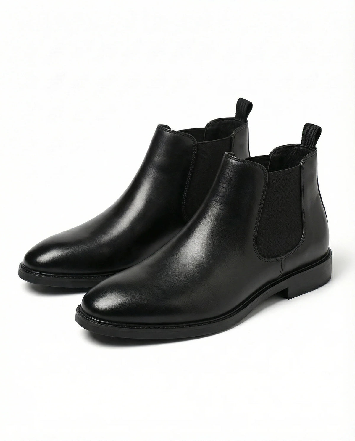 Men's burnished leather Chelsea boots styled on foot