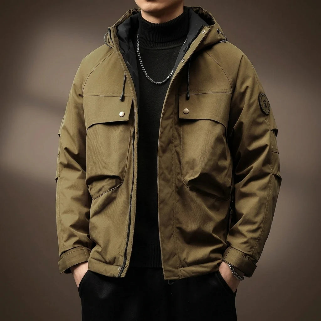 Close-up of the cargo flap pocket on the men's beige field jacket
