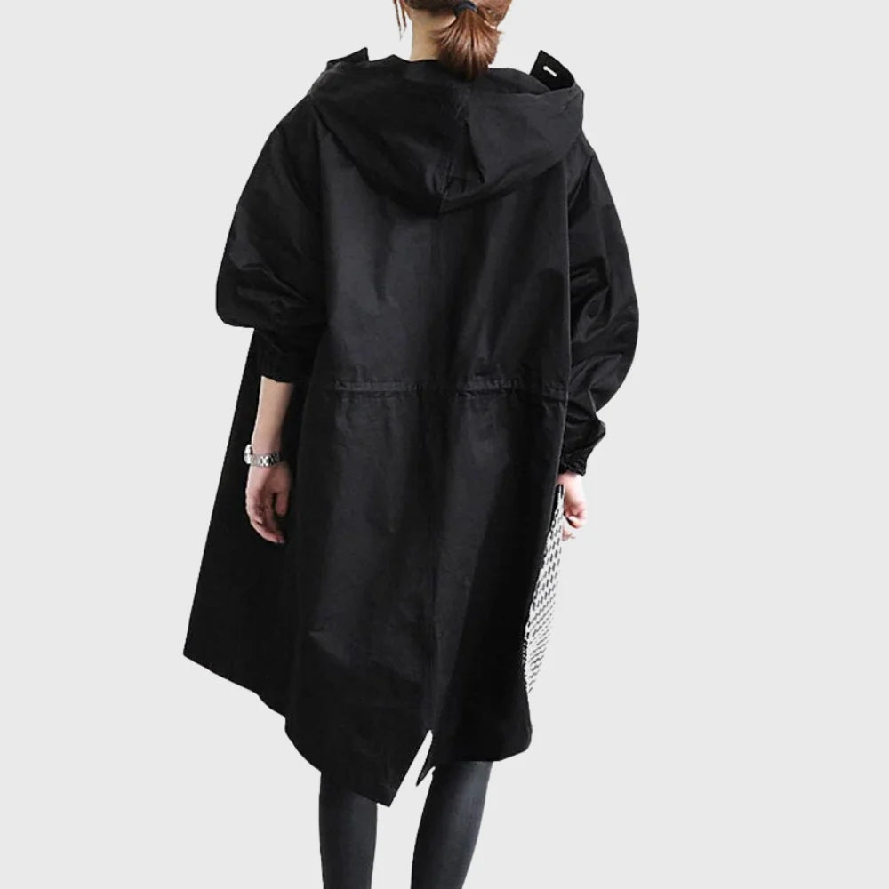 Women's hooded longline trench coat styled on model
