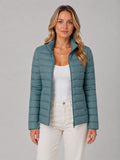 Women's slim-fit quilted jacket in blue with zip-up front