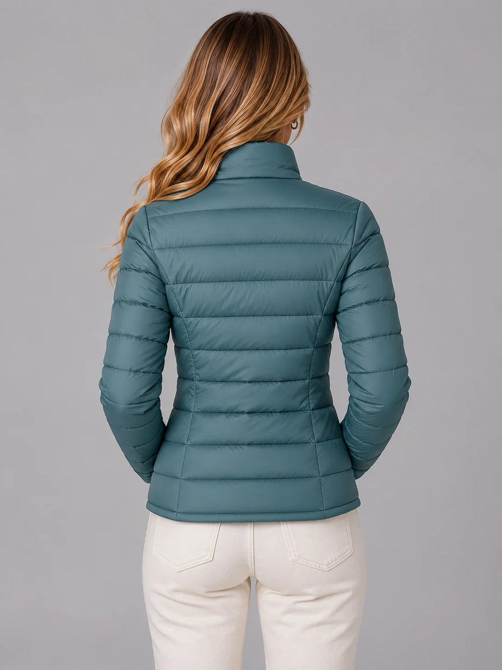 Women's slim-fit quilted jacket styled on model
